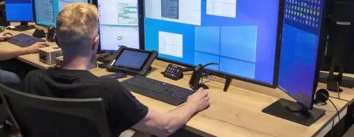 Man at computer using windows